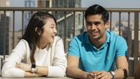 Two college of Dental Medicine students outside.